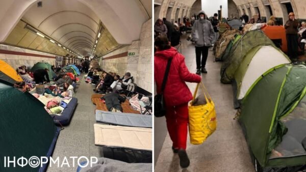 Натовп людей на платформі Київського метрополітену під час повітряної тривоги, де помітні намети