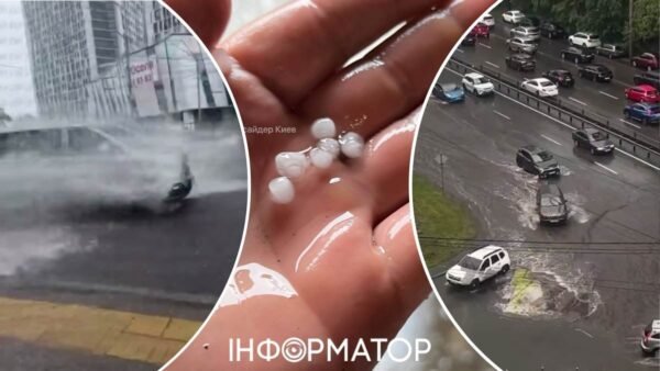 Автомобілі на затопленій вулиці Києва під час зливи